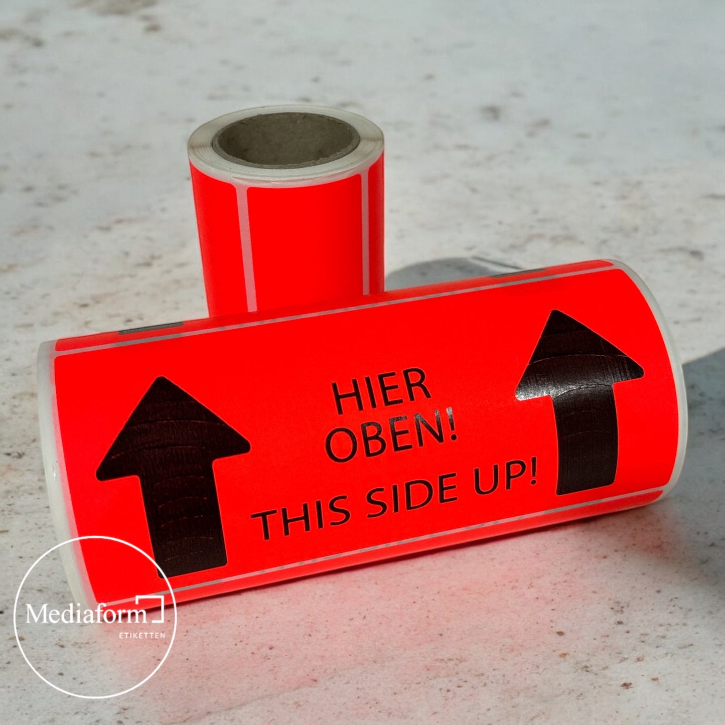 Etikett "Hier oben" 150x70mm neon rot